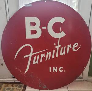 lot 17 image: VINTAGE 1950S METAL B-C FURNITURE INC. GRAND PRAIRIE CIRCULAR SIGN AS SHOWN. APPROX. 36 DIAMETER.