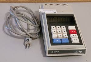 lot 31 image: VINTAGE SHARP QT-8D ELECTRONIC DESKTOP CALCULATOR MICRO COMPET JAPAN AS SHOWN.
