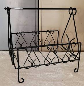 lot 44 image: WROUGHT-IRON STYLE BASKETHOLDER WITH DESIGN AS SHOWN. APPROX. 16.5 W X 12.5 D X 15.5 H.