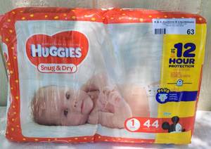 lot 63 image: PACK OF HUGGIES SNUG AND DRY DIAPERS 44 COUNT AS SHOWN.