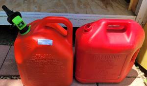 lot 66 image: LOT OF 2 PLASTIC GASOLINE CANS AS SHOWN. ONE APPEARS TO BE FULL.