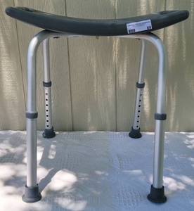 lot 69 image: MEDLINE ALUMINUM SHOWER BENCH WITH ADJUSTABLE HEIGHT IN COLOR AS SHOWN.
