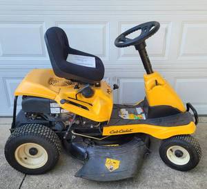 lot 4 image: CUB CADET 30 RIDE ON LAWN MOWER MODEL CC 30 WITH MANUAL AS SHOWN. ALWAYS GARAGE KEPT. CHECK IT OUT