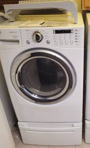 lot 47 image: LG STEAMDRYER MODEL DLEX7177WM WITH PEDESTAL, MANUAL AND ACCESSORIES AS SHOWN. THIS UNIT WAS STILL CONNECTED WHEN PICTURES WERE TAKEN.