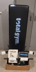 lot 72 image: TOTAL GYM EXERCISE MACHINE WITH ACCESSORIES AND MANUAL AS SHOWN.