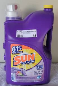 lot 88 image: UNOPENED SUN TRIPLE CLEAN LAUNDRY DETERGENT IN TROPICAL BREEZE AROMA AS SHOWN. 188 OUNCES.