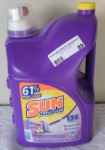 lot 89 image: UNOPENED SUN TRIPLE CLEAN LAUNDRY DETERGENT IN TROPICAL BREEZE AROMA AS SHOWN. 188 OUNCES.
