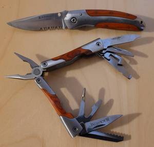 lot 92 image: SET OF 2 - BLACKSMITH KNIFE AND MULTI-TOOL AS SHOWN.