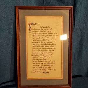 lot 12 image: framed needle point wall hanging