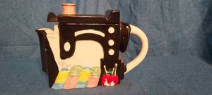 lot 28 image: Decorative ceramic sewing machine water pitcher
