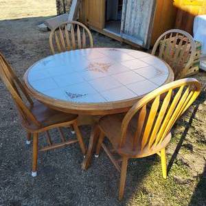 lot 86 image: 4 foot diameter tile top dining table and 4 chairs