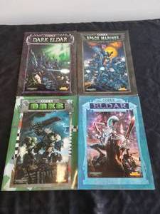 lot 2 image: Selection of Codex gaming books - Dark Elder, Space Marines, Orks, and Eldar