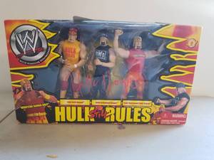 lot 5 image: Hulk Hogan action figures - box signed by Hulk Hogan - authenticity unknown