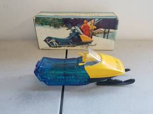 lot 21 image: Snowmobile Avon after shave decanter with box