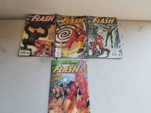 lot 37 image: Selection of 4 Flash comics
