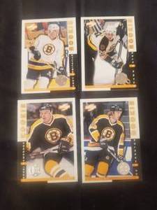 lot 85 image: Selection of 4 NHL Boston Bruins rookie hockey cards