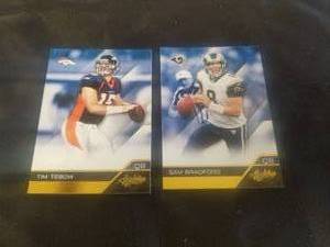 lot 86 image: Tim Tebow and Sam Bradford football cards