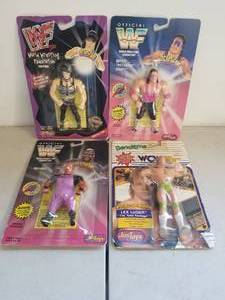 lot 204 image: WWF wrestling poseable collectable action figures Bret Hart, Chyna, Lex Luger, and Mabel
