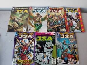 lot 223 image: Selection of 7 JSA comics