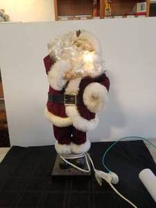 lot 180 image: Santa Claus - lights up and plays music - 27 tall