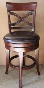 lot 45 image: Cushioned Swivel Bar Height Chair with Mahogany Finish  PROCEEDS FROM THIS ITEM GOES TO SHARE-FEST TEXAS