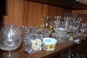 lot 132 image: Glassware on Shelf Ice Cream Dishes, Mikasa Clock, Stemware and Candle Holders