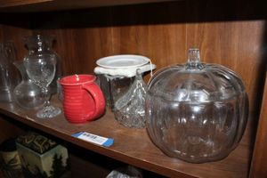 lot 134 image: Glassware on Shelf Clear Pumpkin Lidded Dish, Red Mug and Clear Vases