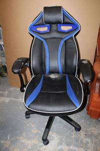 lot 99 image: Gamer Racing Chair with Blue Accents as shown