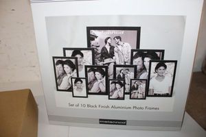 lot 118 image: Melannco Set of 10 Aluminum Photo Frames, Unopened in Box