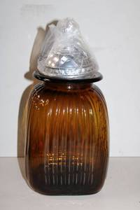 lot 166 image: Set of 3 Brown Glass Cannisters with Aluminum Toppers still in Boxes (Largest one is pictured) PROCEEDS FROM THIS ITEM GOES TO SHARE-FEST TEXAS