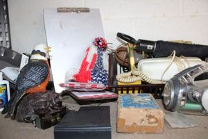 lot 175 image: Misc. Shelf Contents Work Light, Padlock, Paper Rolls for adding machine, RedWhite and Blue Stocking Hat