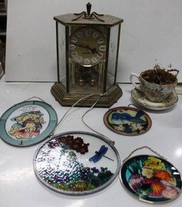lot 100 image: Vintage Seth Thomas Table Clock with Rotating Pendulum (Reads made in Germany), Tea cup Planter and Window Sun Catchers