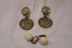 lot 190 image: Signed CORO earring duo. Includes a pair of Canadian coin dangle earrings and clip ball earrings. Both marked Coro