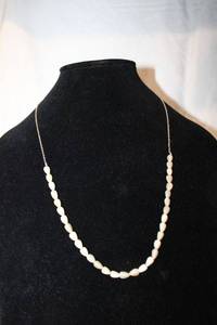 lot 195 image: Signed CaCo Sterling silver mother of pearl bead and Figarucci chain 24L necklace. Marked Sterling on clasp in 2 locations