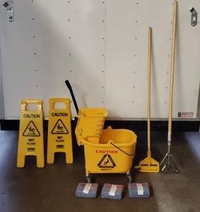 lot 61 image: Lot of Cleaning Supplies - Mop Bucket, Mop Heads, Mop Handles, Wet Floor Signs