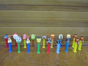 lot 61 image: COLLECTORS LOT OF PEZ DISPENSERS... WINNIE THE POOH, WOODY, THOMAS THE TRAIN, SHREK, BEE MOVIE, BUZZ LIGHTYEAR, AND MANY MORE.