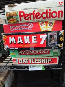 lot 85 image: VINTAGE BOARD GAMES-ORIGINAL 1978 BATTLESHIP BY MILTON BRADLEY, MONOPOLY WITH SPEED DIE, MAKE 7, GUESS WHO, ORIGINAL 1975 PERFECTION GAME..
