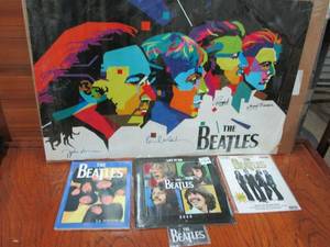 lot 86 image: BEATLES LOT- BEATLES POSTER WITH PRINTED SIGNATURES, BEATLES LET IT BE 2020 CALENDAR NEW IN PACKAGING, THE BEATLES PATCH, THE BEATLES MAGAZINES IN SPANISH, POSTER SHOWING GUITAR CORDS