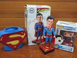 lot 120 image: SUPERMAN LOT- WARNER BROS DC COMIC SUPERMAN BOBBLEHEAD BY NECA IN BOX, POPDC UNIVERSE SUPERMAN VINYL FIGURE IN BOX