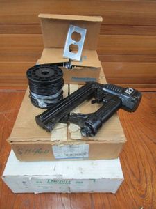 lot 136 image: NAIL GUN FOR AIR COMPRESSOR, ELECTRICIAN MATERIALS INCL. COATED COPPER WIRE, SEE PICS