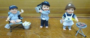 lot 157 image: ASHTON DRAKE GALLERIES, DALLAS COWBOYS TAILGATIN TOTS DOLL COLLECTION- COWBOYS WIN, ILL HAVE ANOTHER IS THE FIRST ISSUE OF THE COLLECTION.COWBOYS ROCK THE LOT, DALLAS COWBOYS ARE SMOKIN HOT
