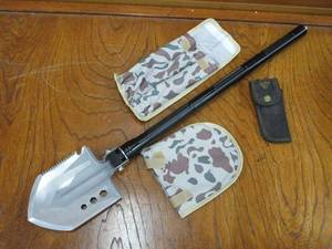 lot 161 image: ALL IN ONE TACTICAL SHOVEL W CARRYING CASE, USE AS A SHOVEL, SAW, KNIVE, SEAT BELT CUTTER, WINDOW BREAKER TIP, WRENCH AND CAN STORE FIRE STARTING NEEDS &amp MORE. SCREWS TOGETHER WITH 3 AVAILABLE PIECES.&nbsp