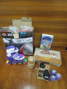 lot 177 image: DISNEYS THE LION KING ON VHS, KIDS ADJUSTABLE INLINE SKATES, ADJUSTABLE UP TO 4 SIZES, FLEXIBLE BULDING STICKS, BICYCLE CELL PHONE HOLDER & MORE