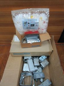 lot 179 image: NIB 5MM TILE LEVELING SYSTEM, GALVANIZED STEEL OUTLET COVERS, SWITCH BOXES