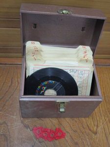 lot 206 image: 45RPM RECORDS IN METAL STORAGE BOX, TITLES ARE PICTURED