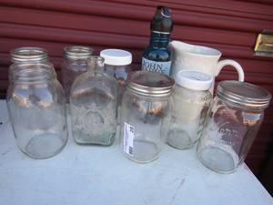 lot 28 image: 7 mason jars, water bottle with clip,   milk glass water pitcher