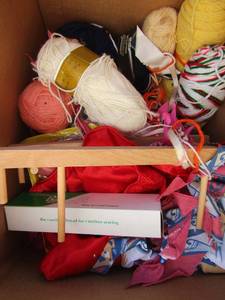 lot 40 image: Box of yarn, scarves, quilting thread,  wooden spool holder