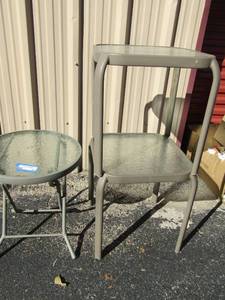 lot 42 image: 3 outside tables- 2 metal frame glass top square   1 fold up matching glass top