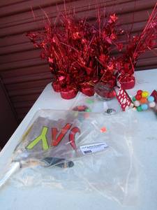 lot 59 image: 8 red party table top dcor  Vintage spinners and Birthday party banner and cake topper