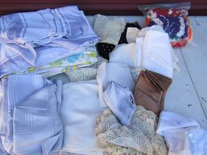 lot 60 image: Box full of Napkins, table cloths, doilies and more